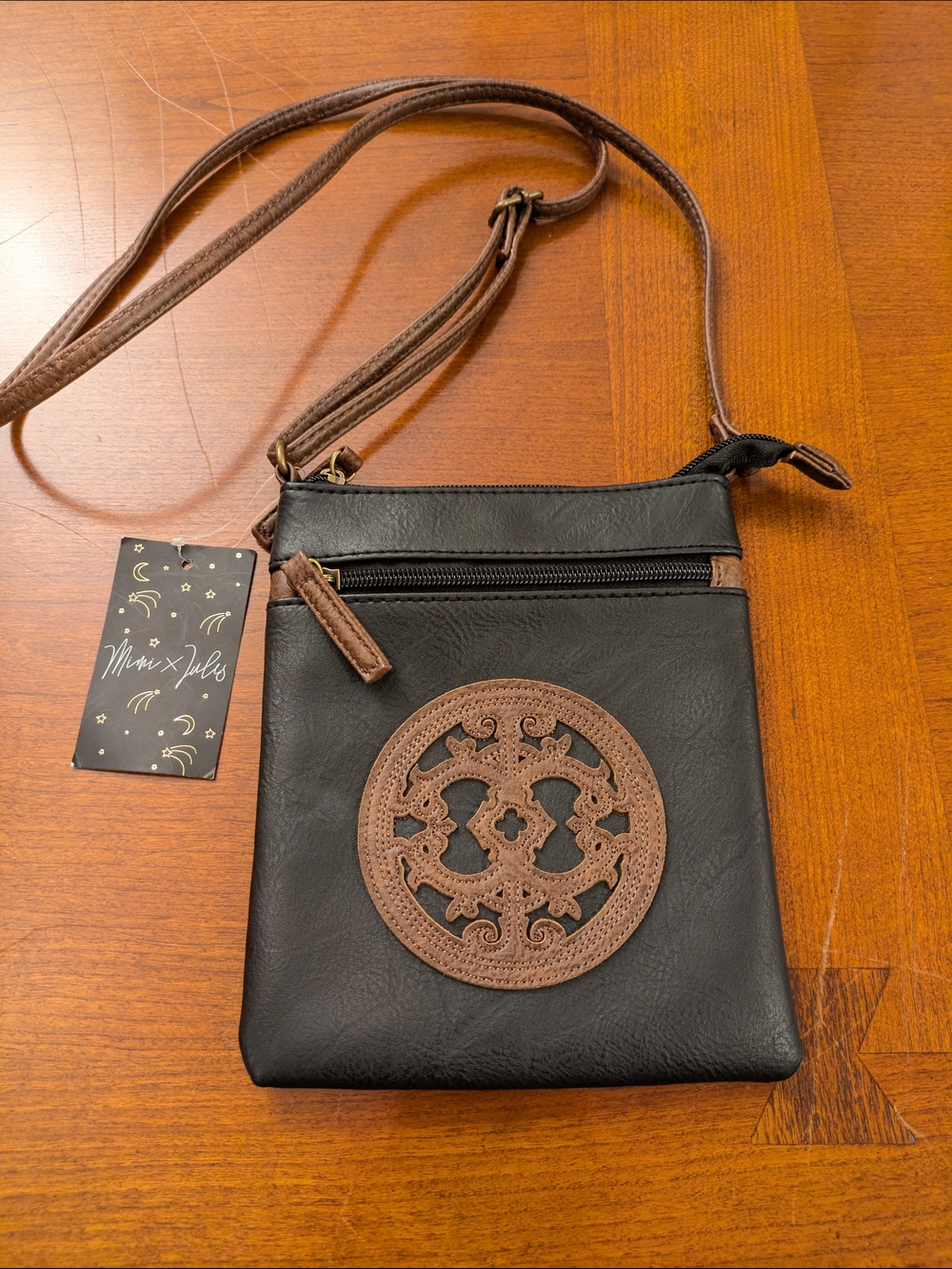 Mimi x Jules Black and Brown Crossbody Bag with Decorative Brown Medallion NWT